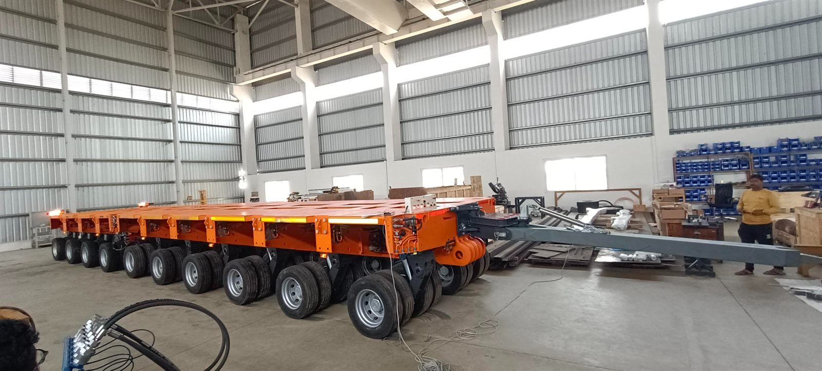 Modular hydraulic trailer with drawbar in the assembly bay